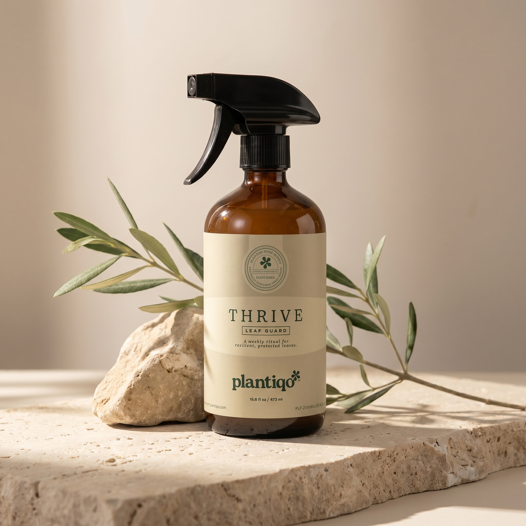 Thrive Leaf Guard Elixir — natural houseplant protection and immunity spray in amber glass bottle, 16 oz