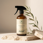 Load image into Gallery viewer, Thrive Leaf Guard Elixir — natural houseplant protection and immunity spray in amber glass bottle, 16 oz